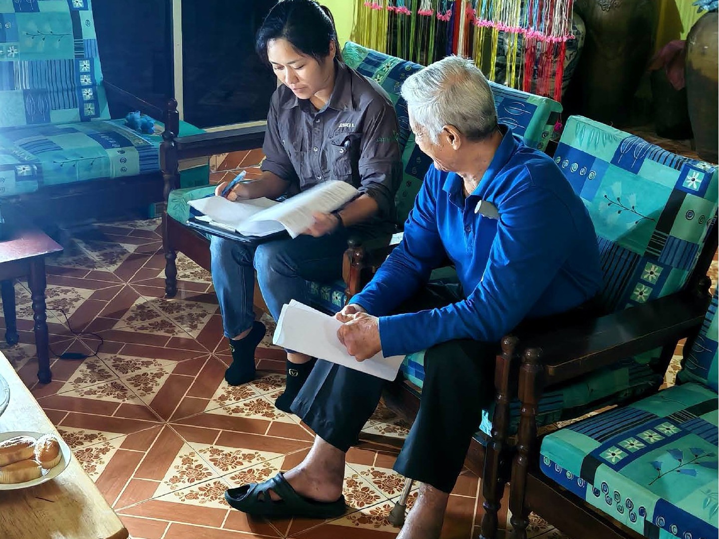 Explaining grievance form to the communities.